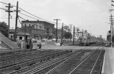 FM-CPA24-5-2401-Train-West Approaching Tulip Ave. Xing-Floral Park-View E-Park Tower-Hemp Br. at  R-1955 (Keller).jpg (129804 bytes)