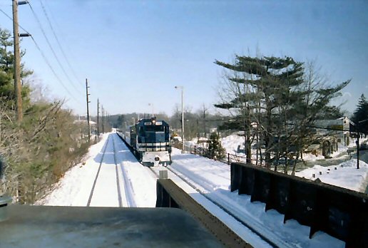 http://trainsarefun.com/lirr/before_after/SmithtownEastboundsnow.jpg