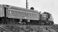 RS3-1551-P74A-7502 and MTK Train on MTK Br Embankment -Dunton- View NE-04-21-62 (Faxon-Keller).jpg (106825 bytes)