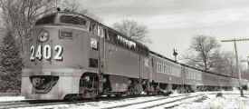 lirr2402_westbound-Stony-Brook_BK-semaphore-block-signals-behind-train_Pedestrian-crossing-SUNY-campus_c.1950's_JohnKrause-GaryEverhart.jpg (85638 bytes)